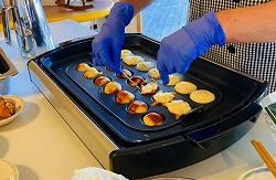 焼いてます